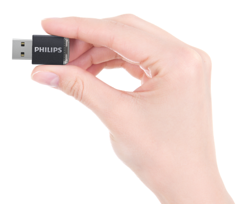Image of Philips Airbridge dongle - size shown in femaie hand